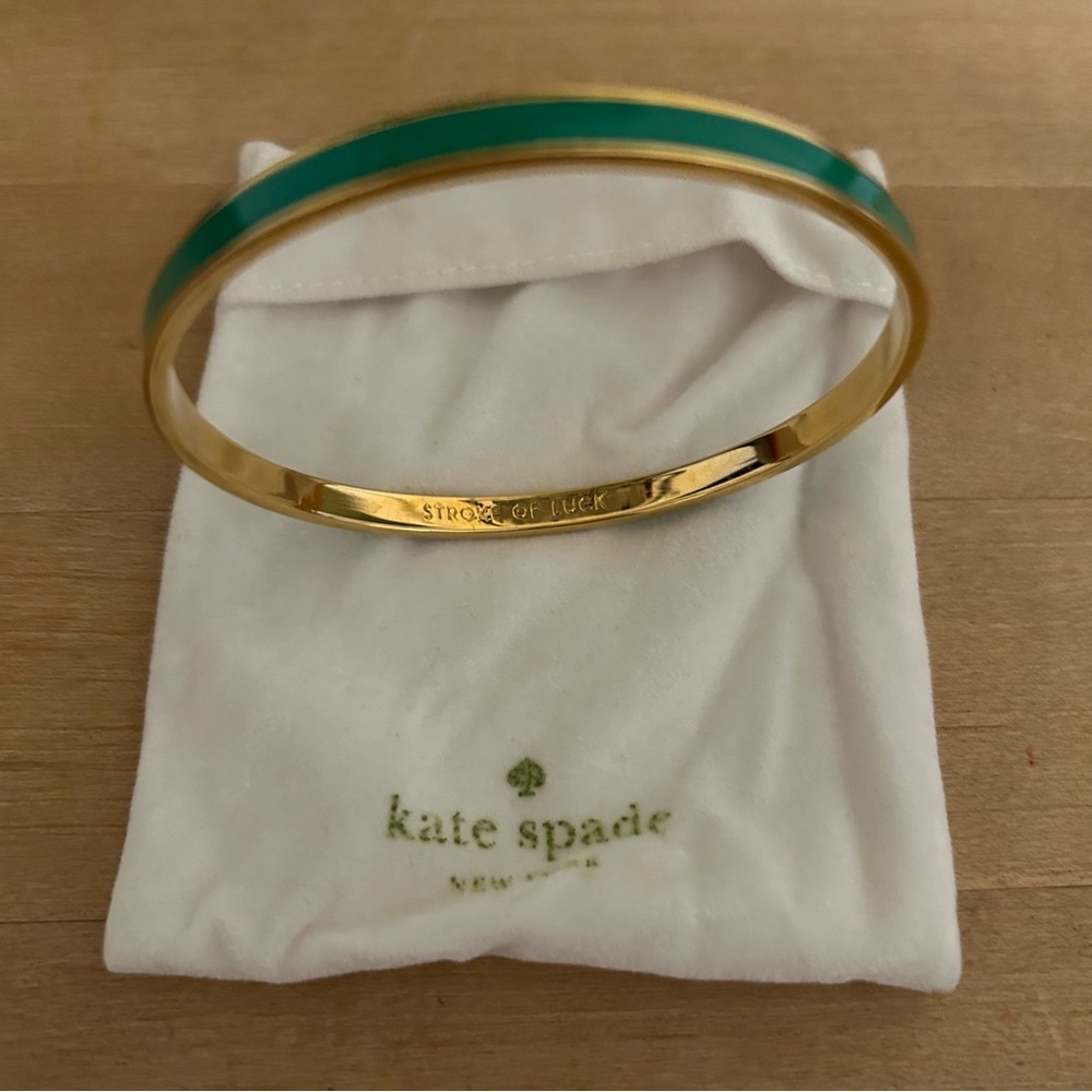 Kate Spade “Stroke of Luck” green enameled bangle